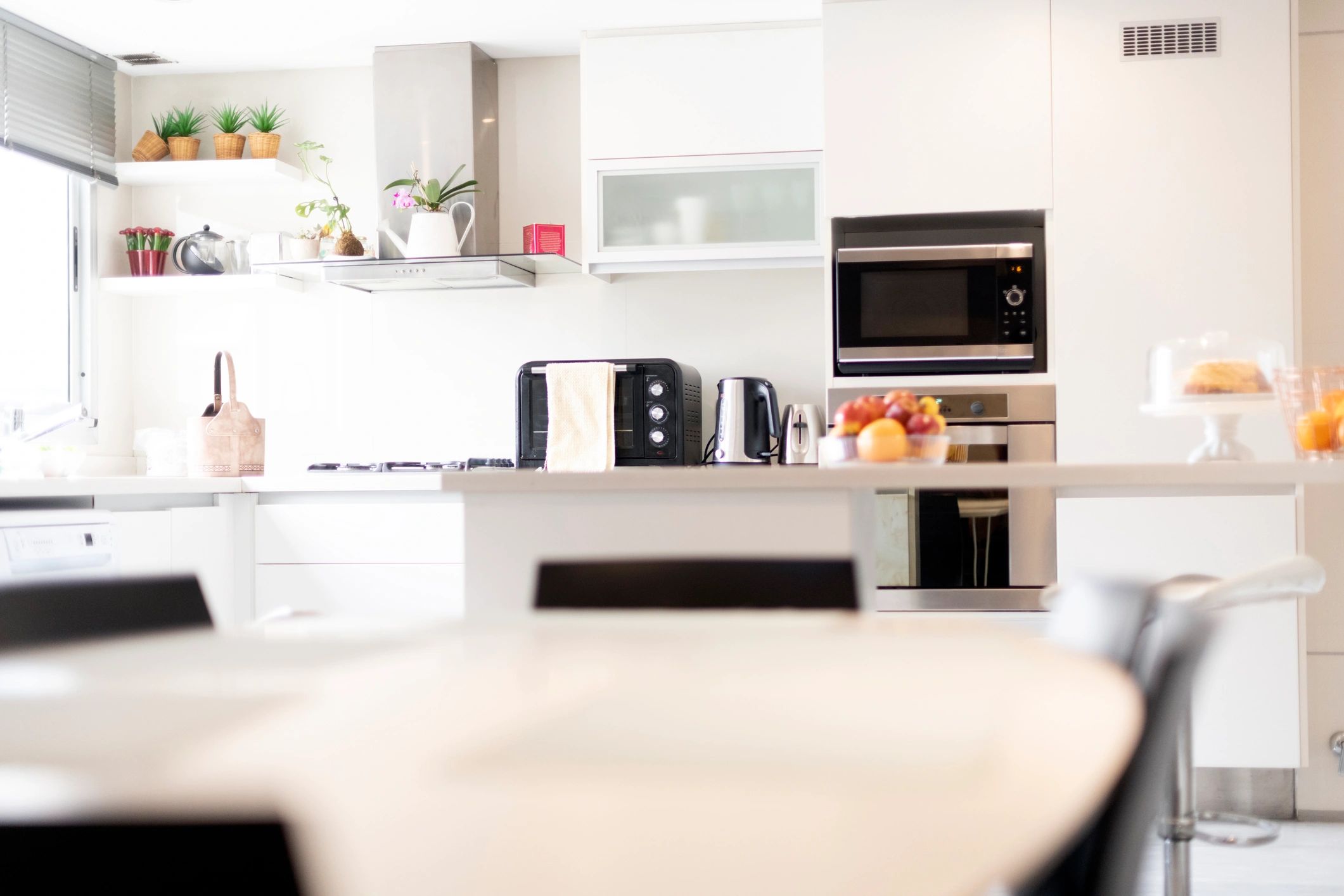 Modern renovated kitchen with natural light and refined finishes